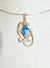 Petite Blue Topaz Pendant hand sculpted in Sterling Silver .925 wire