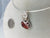 Red Paua Shell Hand sculpted in Argentium Anti tarnish .925 Sterling Silver wire