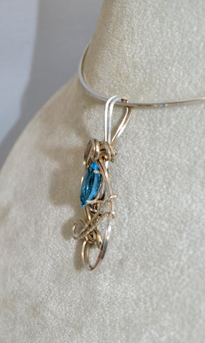 Petite Blue Topaz Pendant hand sculpted in Sterling Silver .925 wire