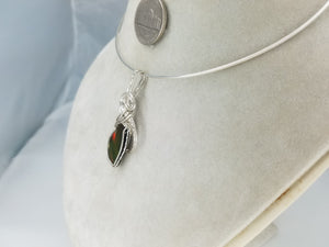 Iridescent Ammolite Gemstone hand sculpted in Sterling Silver Argentium tarnish resistant wire.