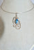 Petite Blue Topaz Pendant hand sculpted in Sterling Silver .925 wire