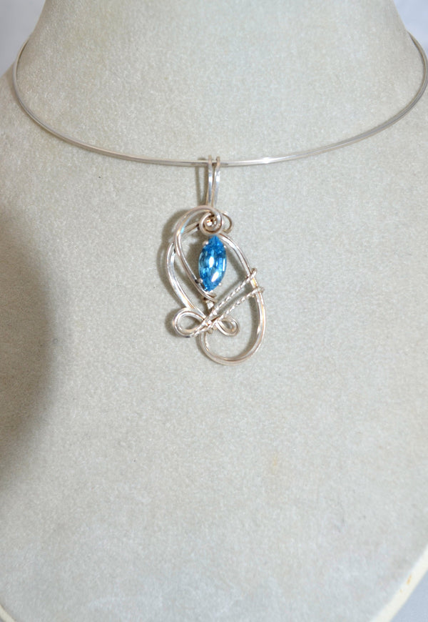 Petite Blue Topaz Pendant hand sculpted in Sterling Silver .925 wire